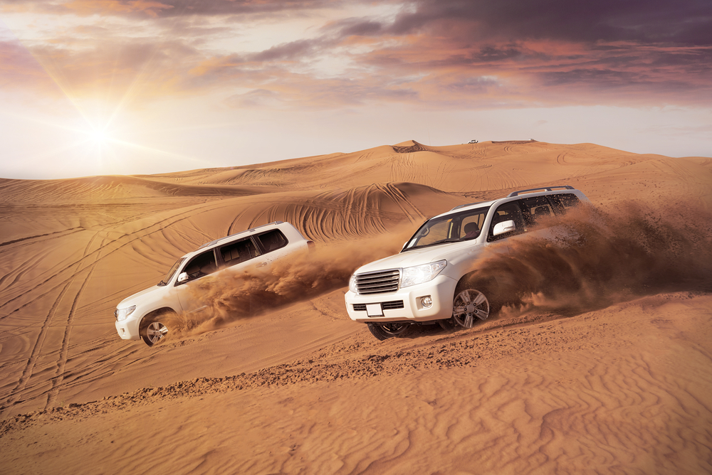white cars in desert