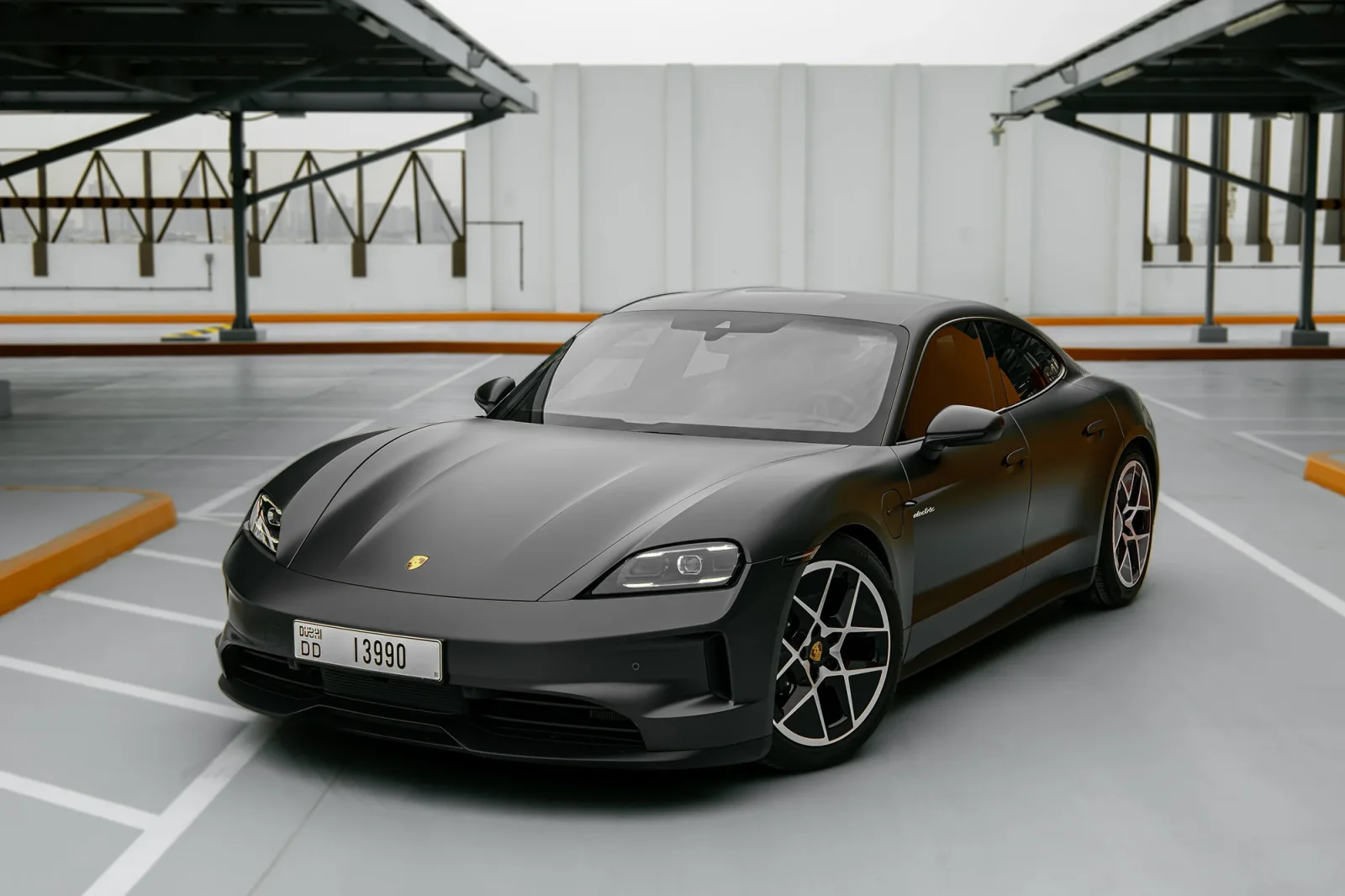 Rent Porsche Taycan  Grey 2025 in Abu Dhabi