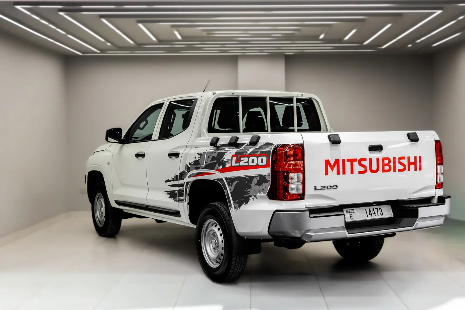 Rent Mitsubishi L200 Double Cap White 2026 in Abu Dhabi - 2 