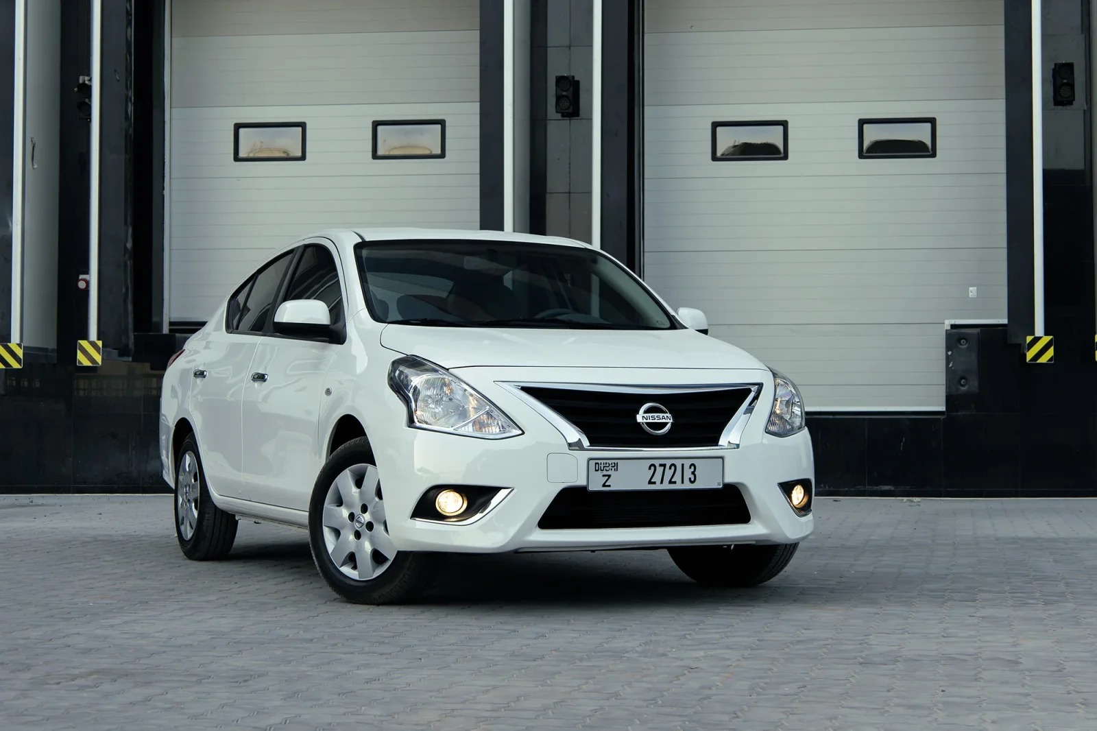 Rent Nissan Sunny  White 2025 in Abu Dhabi