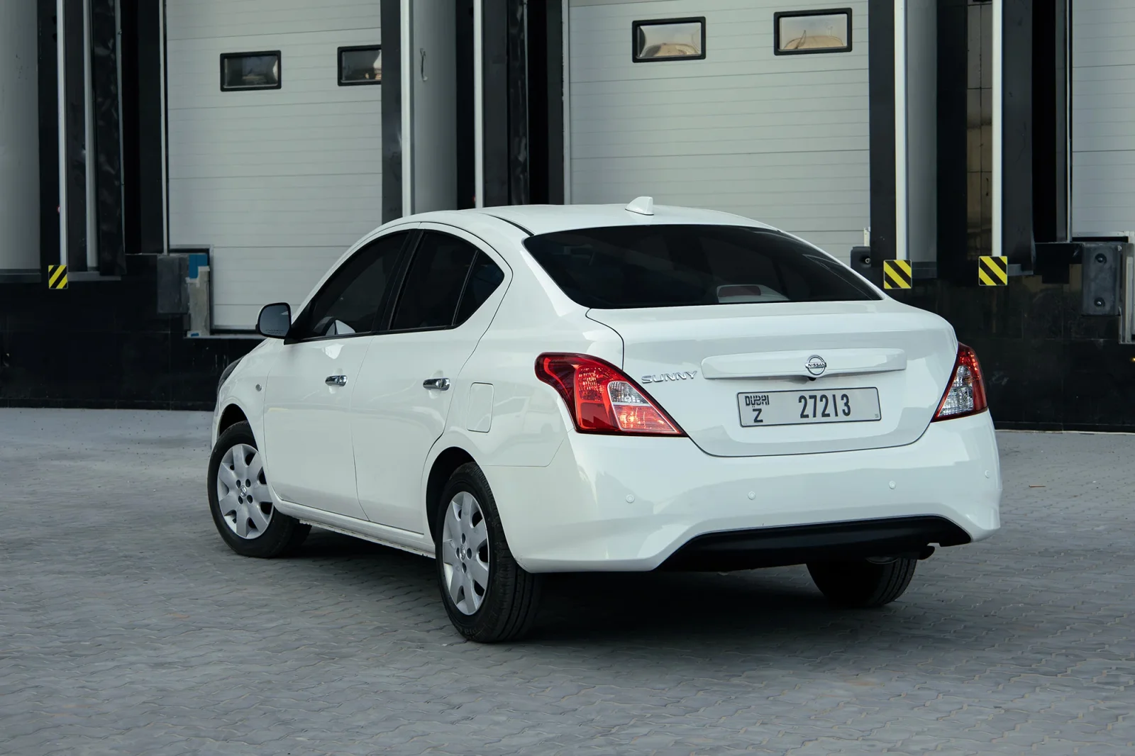 Rent Nissan Sunny  White 2025 in Abu Dhabi - 13 