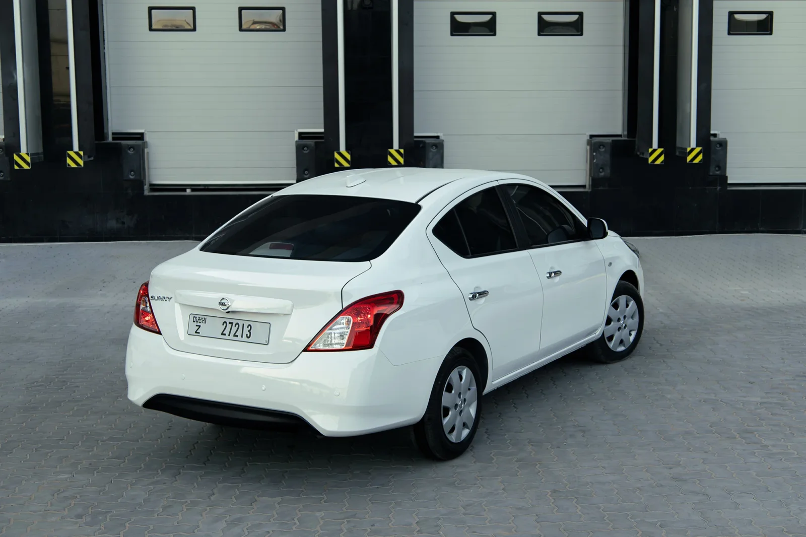 Rent Nissan Sunny  White 2025 in Abu Dhabi - 9 