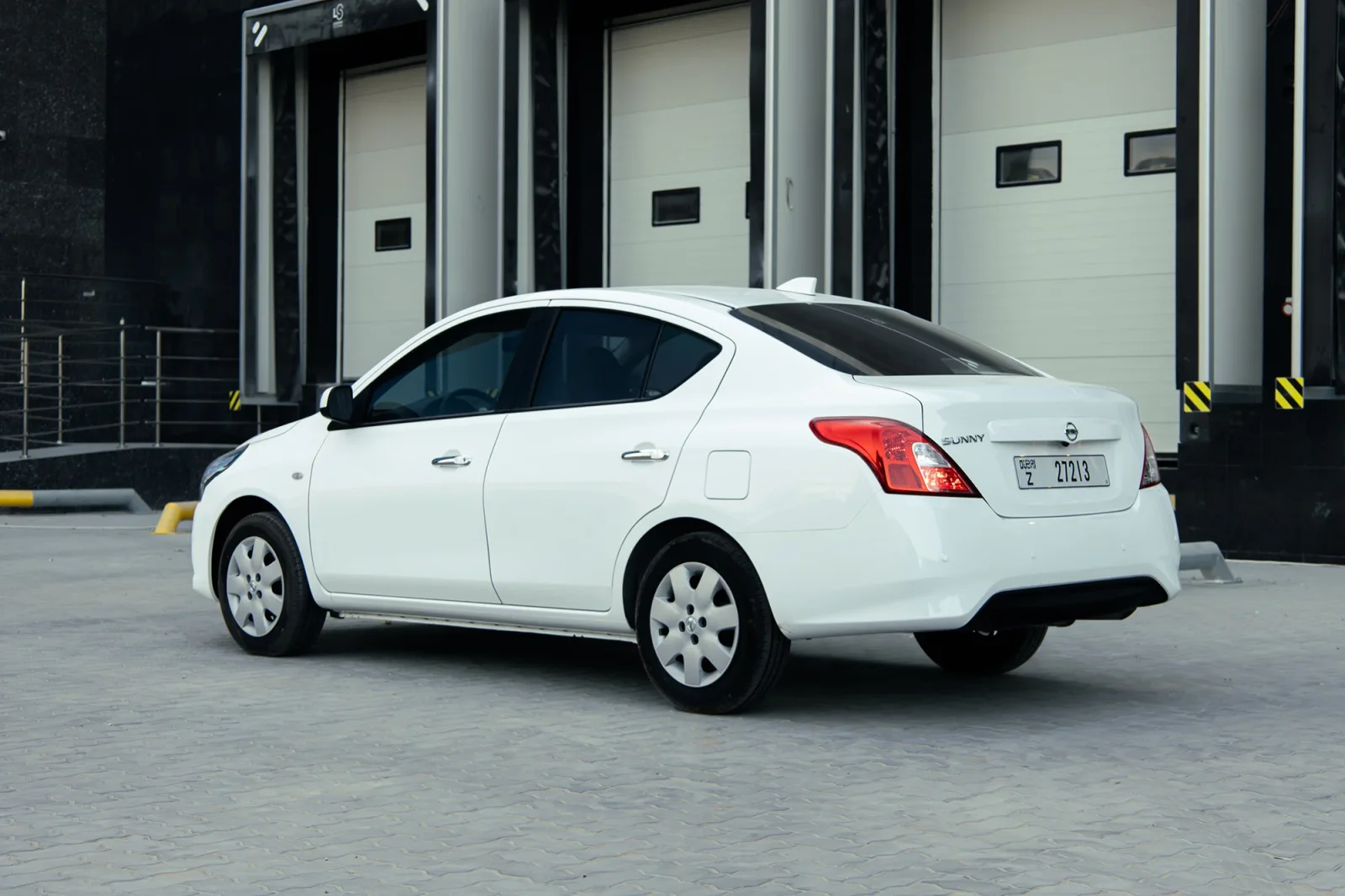 Rent Nissan Sunny  White 2025 in Abu Dhabi - 12 
