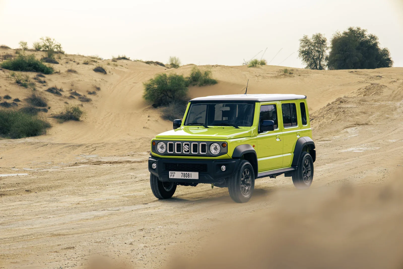 Rent Suzuki Jimny  Yellow 2026 in Abu Dhabi - 14 