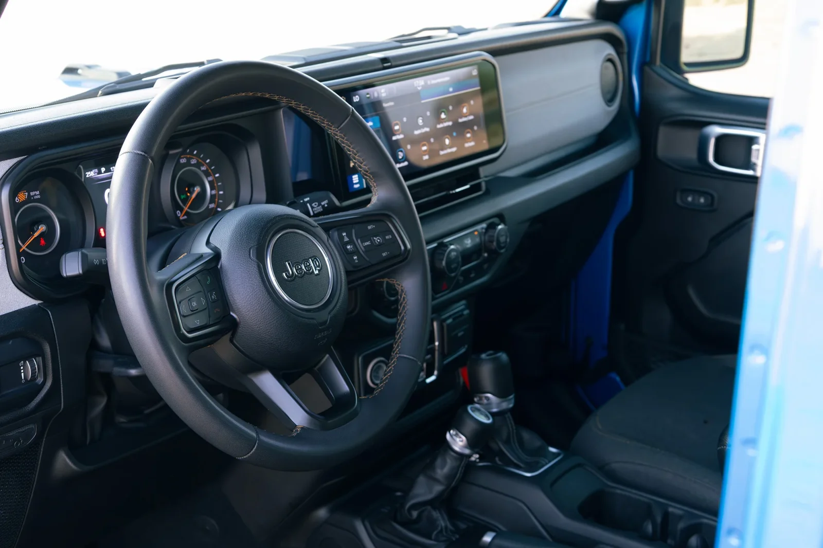 Rent Jeep Wrangler  Blue 2024 in Abu Dhabi - 2 
